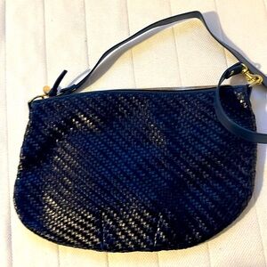 Woven blue leather. Lovely! Never used